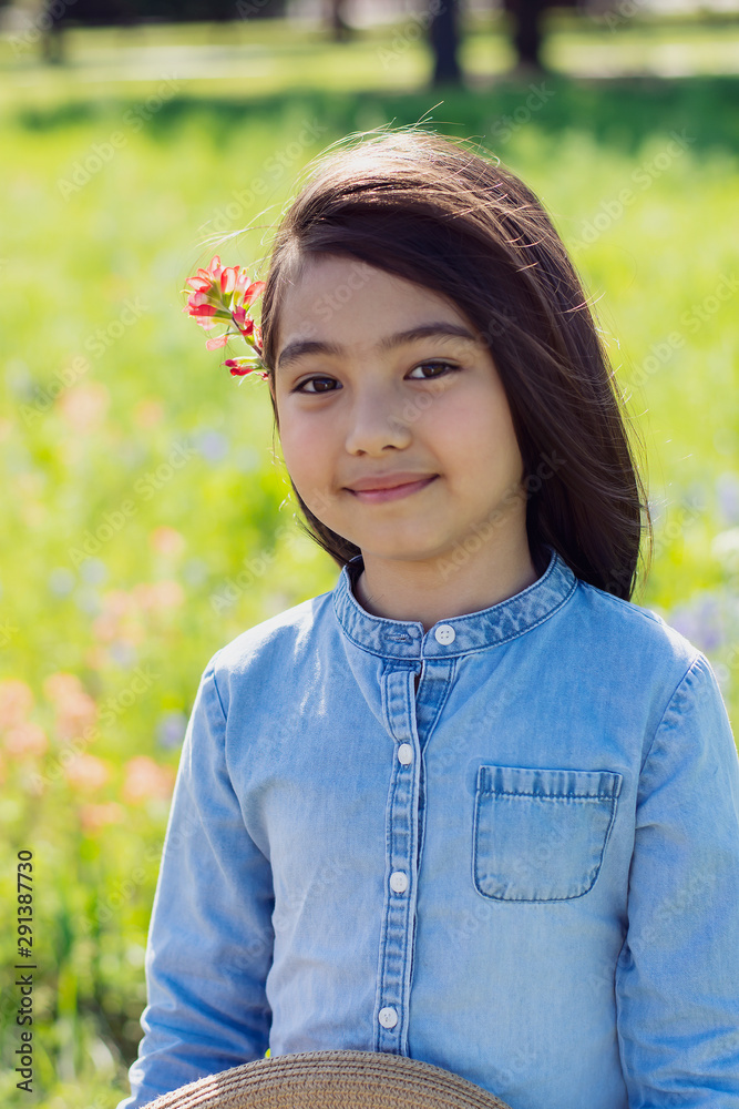 Portrait of a little girl in spring season