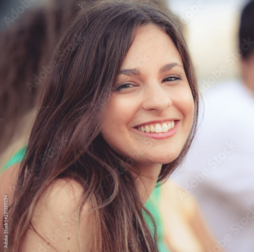 portrait of a happy latin girl on the street