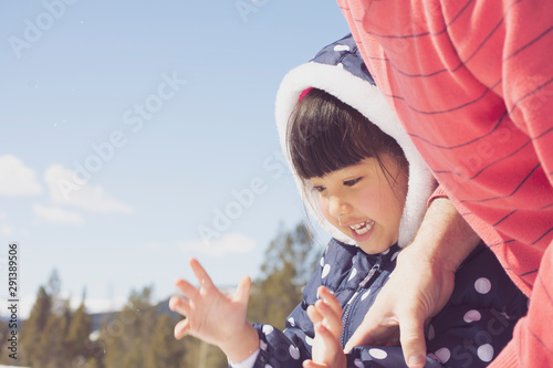 Portrait of a little girl in winter outfit in Wyoming, USA