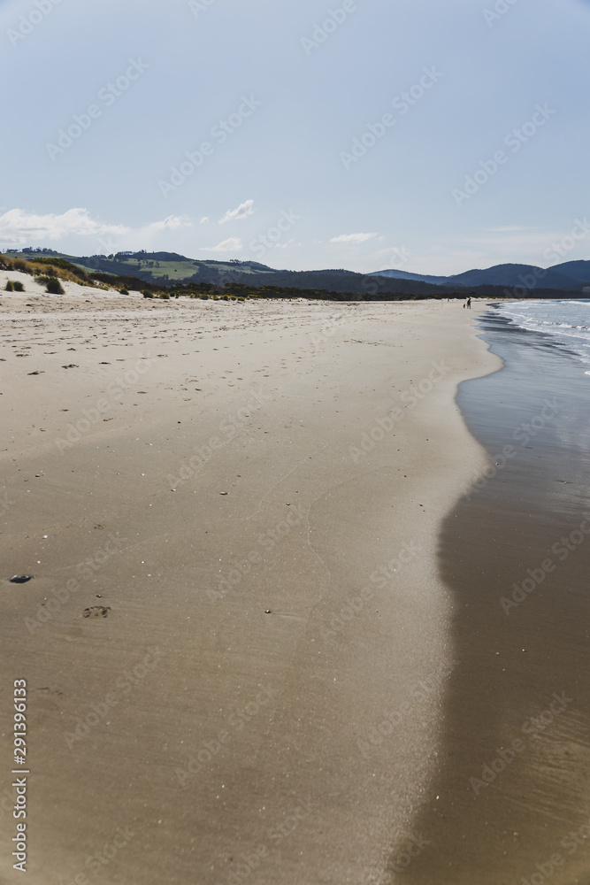 sunny pristine and deserted beach overlooking the South Pacific Ocean sunny pristine and deserted beach overlooking the South Pacific Ocean