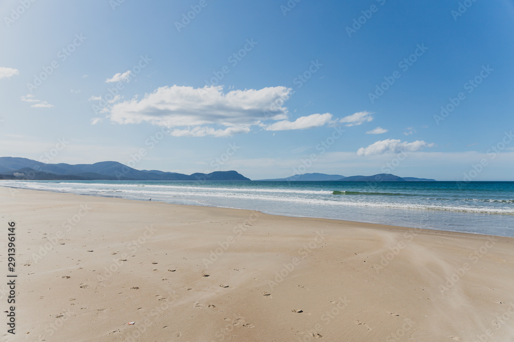 sunny pristine and deserted beach overlooking the South Pacific Ocean sunny pristine and deserted beach overlooking the South Pacific Ocean