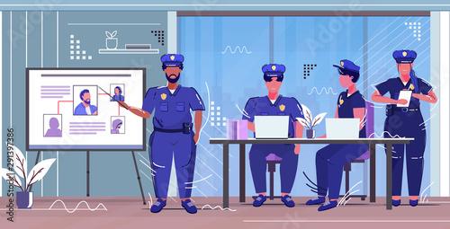 police officer presenting to colleagues information board with thief photo african american policeman in uniform security authority justice law service concept sketch full length horizontal