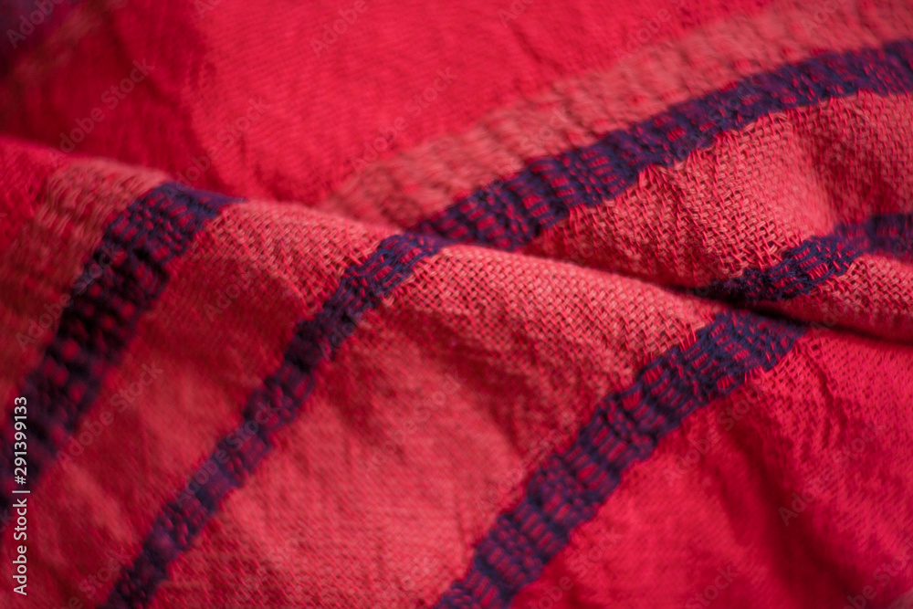 Red woolen fabric cloth background