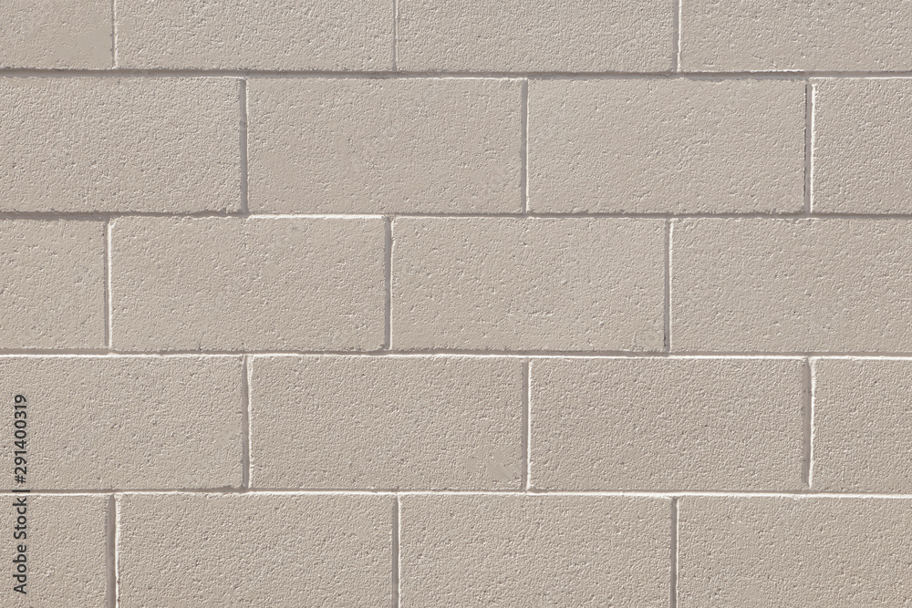 Naklejka premium Soft pastel cream colored brick wall