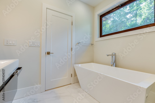 Interior design of a modern bathroom in a newly built house or apartment  hotel room.