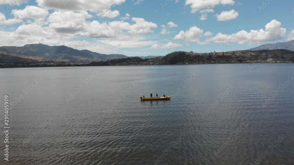 Dron fly over lake San Pablo and boat with fishermen Dron fly over lake San Pablo and boat with fishermen