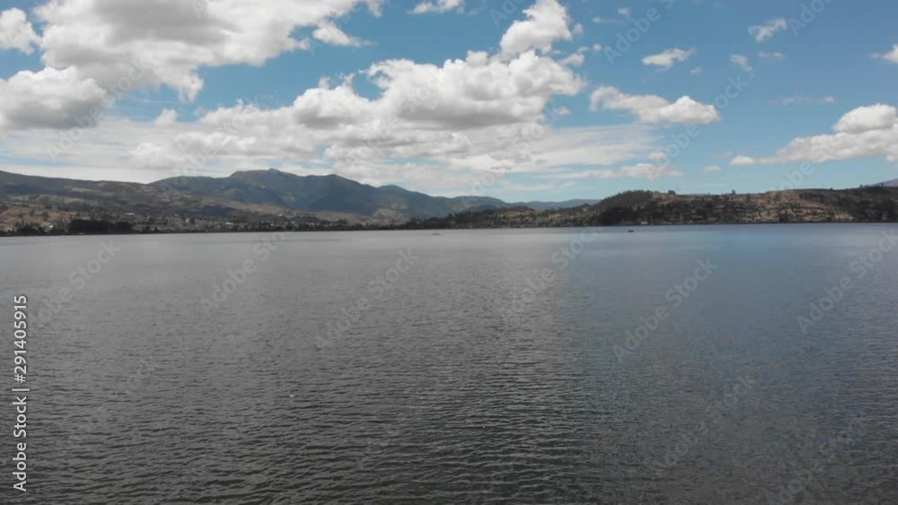 Dron low fly over the lake San Pablo near the shore Dron low fly over the lake San Pablo near the shore