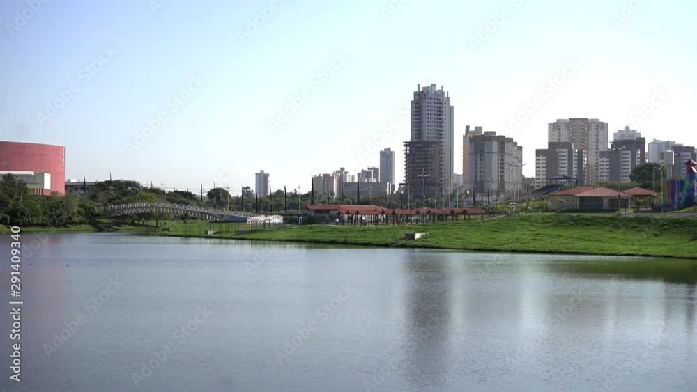 BRAZILIAN CITY LANDSCAPE IN FRONT OF A GREAT LAKE BRAZILIAN CITY LANDSCAPE IN FRONT OF A GREAT LAKE
