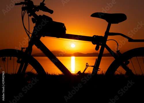 bike silhouette on sunrise