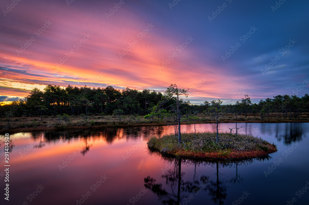 Colorful sunrise at one of the bog ponds of Soomaa national park, Estonia Colorful sunrise at one of the bog ponds of Soomaa national park, Estonia