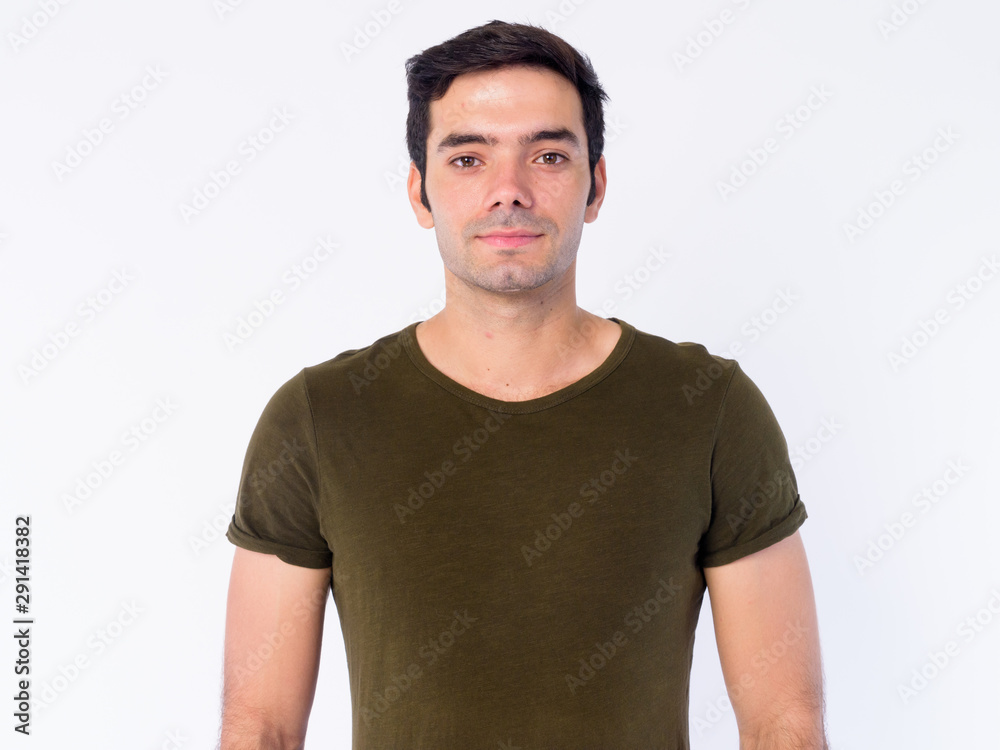 Face of young handsome Persian man looking at camera Face of young handsome Persian man looking at camera
