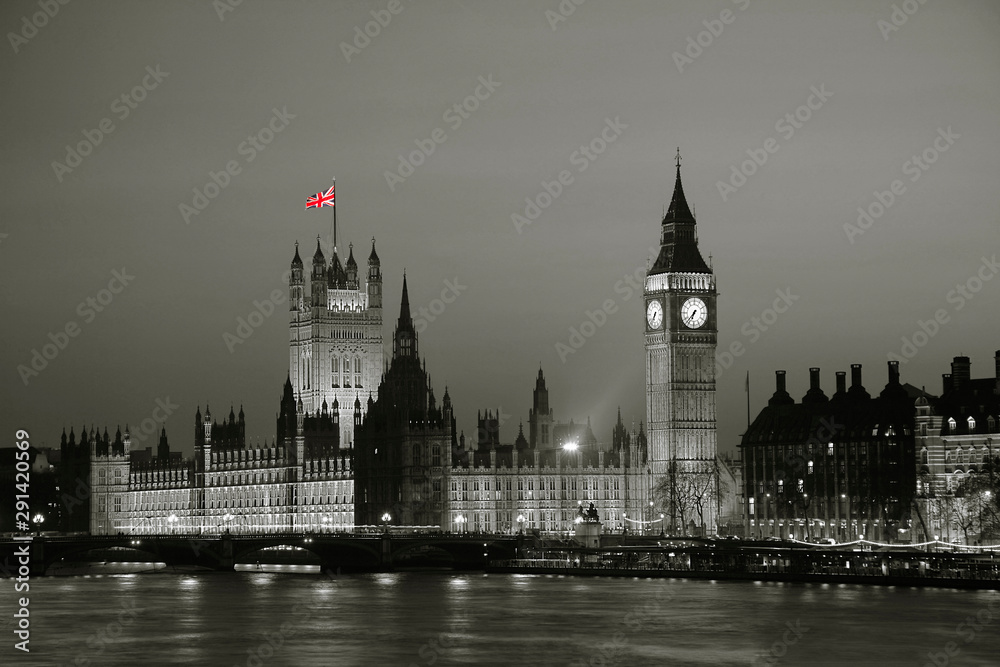 Night view of Westminster Palace over dramatic sunset sky