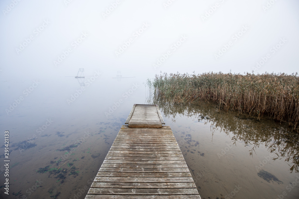 Fototapeta premium Scenic landscape with morning mood and fog at autumn in Finland