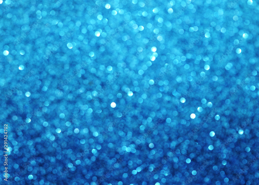 Blurred texture of glitter's paper. Festive background. Blurred texture of glitter's paper. Festive background.