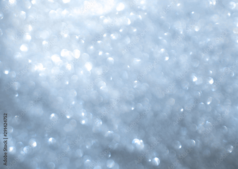 Blurred texture of glitter's paper. Festive background. Blurred texture of glitter's paper. Festive background.