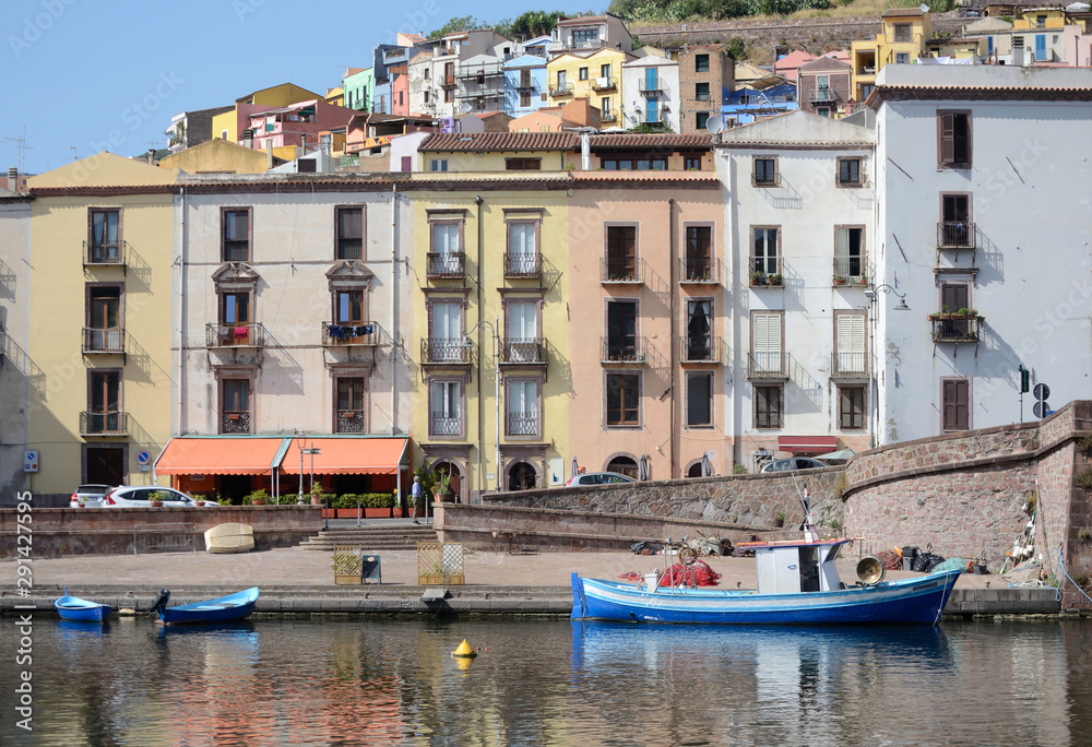 fishing boats moored along the Temo river that crosses the beautiful city of Bosa in north-western Sardinia