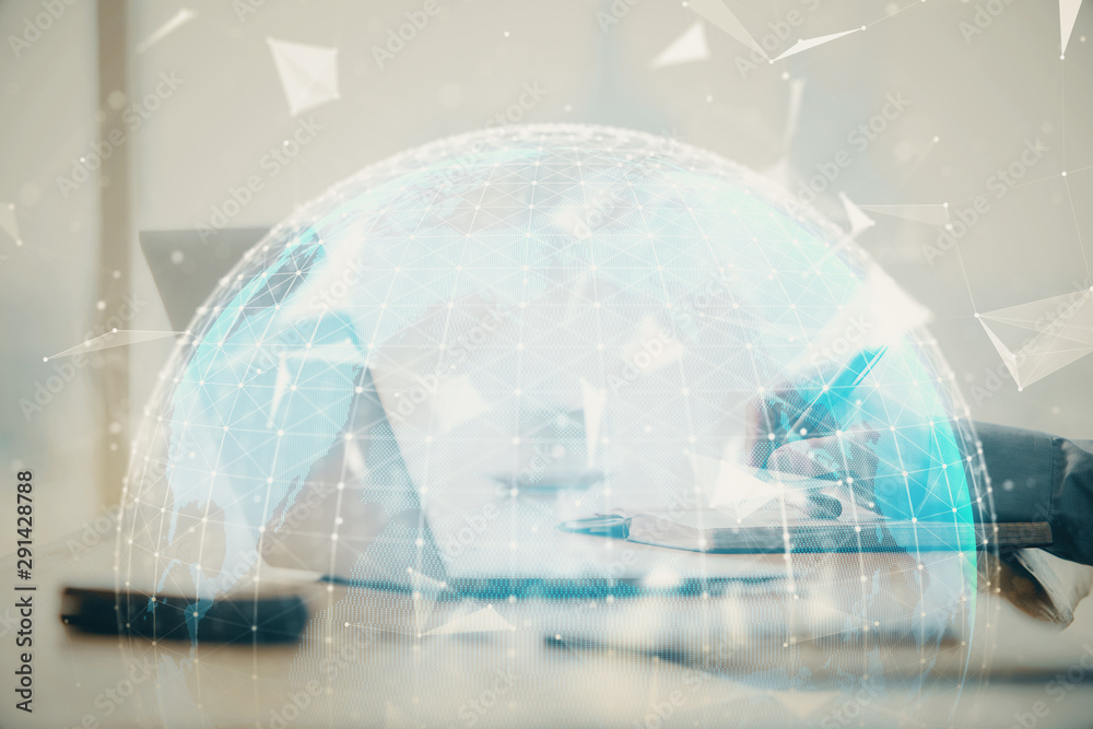 Multi exposure of businessman working on laptop on background. International business hologram in front. Concept of success. Multi exposure of businessman working on laptop on background. International business hologram in front. Concept of success.