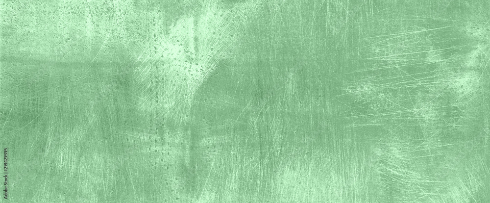 Fototapeta premium Mint cement concrete background. Grunge texture, wallpaper. Copy space. Banner. Concrete texture, stone ground. Trendy mint color