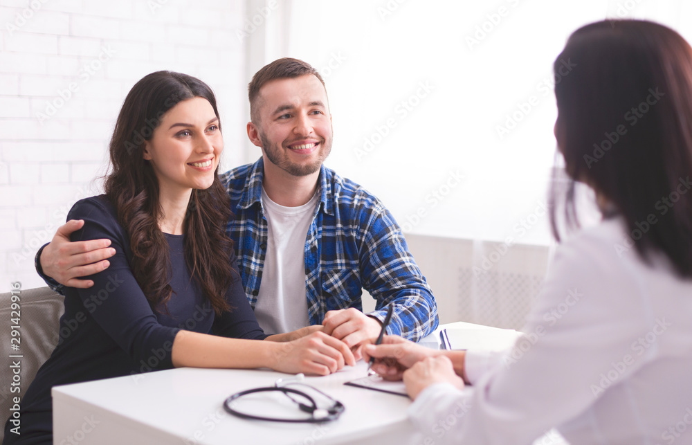 Young couple at doctor's appointment at clinic Young couple at doctor's appointment at clinic