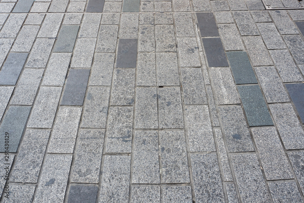 Gray paving slabs. Texture background of stone brick.