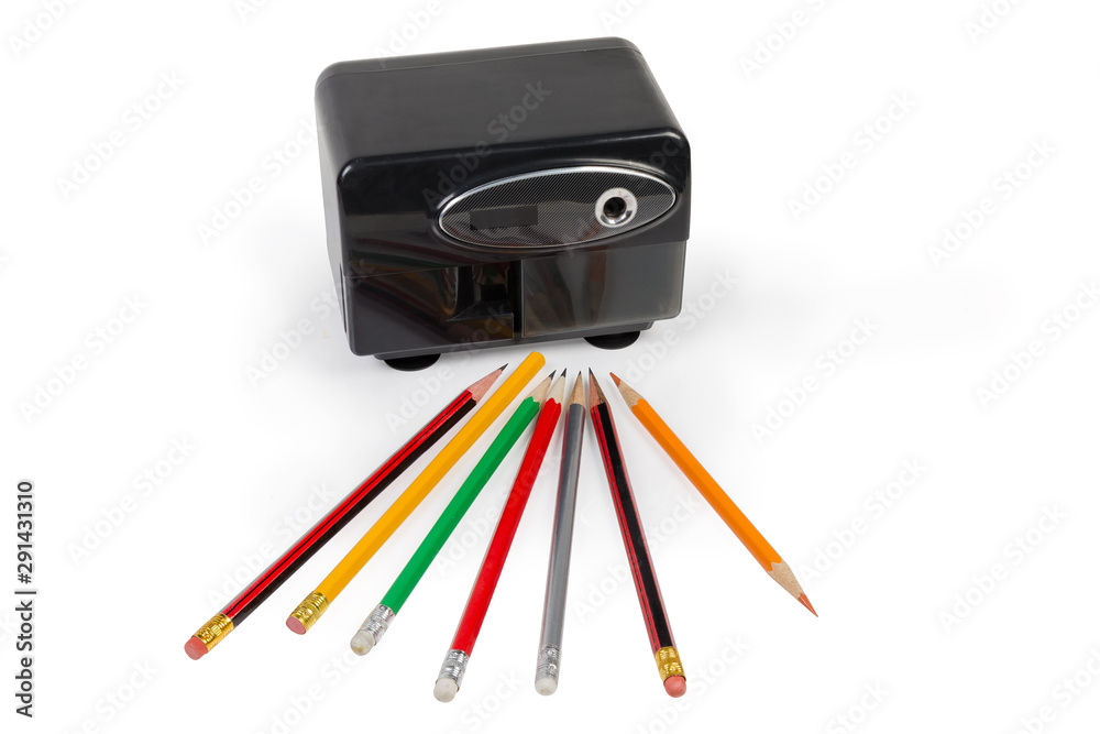 Desk electric pencil sharpener and pencils on a white background Desk electric pencil sharpener and pencils on a white background