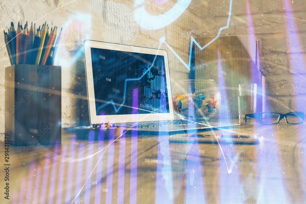 Multi exposure of forex graph and work space with computer. Concept of international online trading. Multi exposure of forex graph and work space with computer. Concept of international online trading.