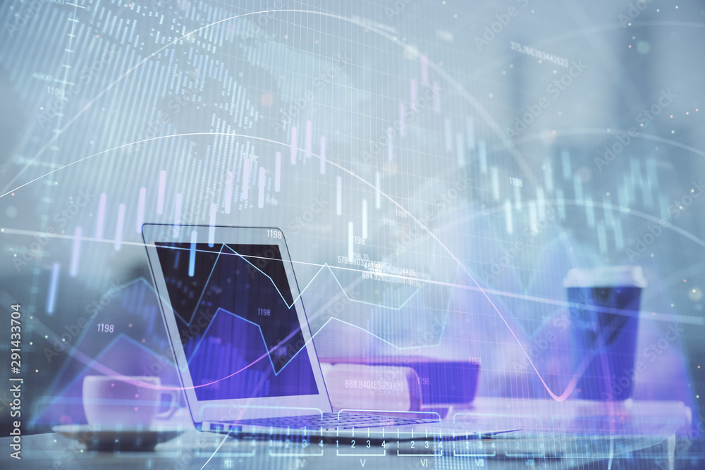 Forex graph hologram on table with computer background. Multi exposure. Concept of financial markets.