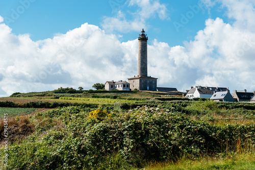 View of the Island of Batz and the lighthouse in summer © jjfarq