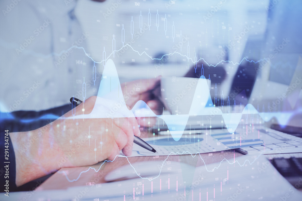 Double exposure hands with stock market chart. Double exposure hands with stock market chart.