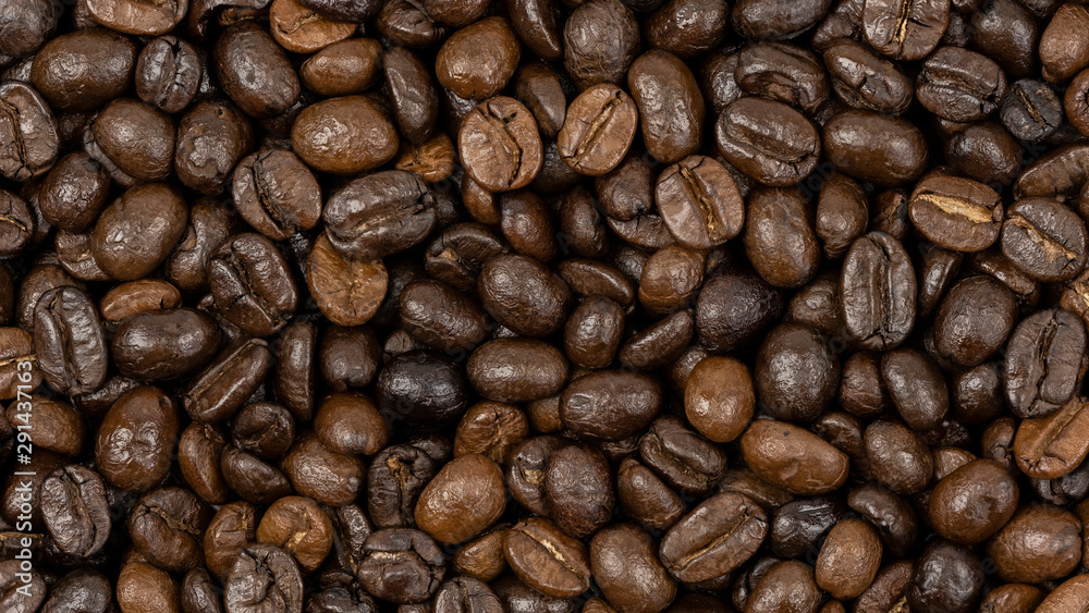 Roasted coffee beans background, Close Up mixture of different kinds of coffee beans. Roasted coffee beans background, Close Up mixture of different kinds of coffee beans.