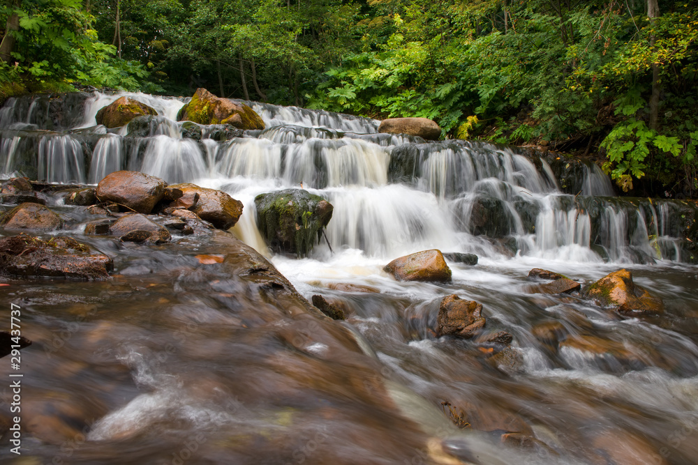Chalpa River with a cascade of waterfalls. Russia Novgorod region, Borovichi district Chalpa River with a cascade of waterfalls. Russia Novgorod region, Borovichi district