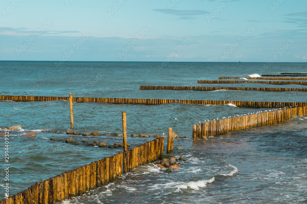 Breakwater on the shore in the Baltic sea. Seascape in the Kaliningrad region