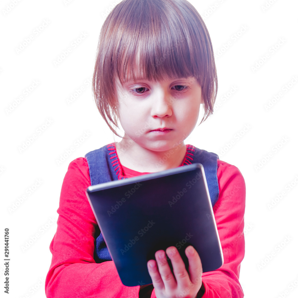 Social Media addiction. Close up little cute child girl holding smart phone as symbol of psychological problems, media mania Social Media addiction. Close up little cute child girl holding smart phone as symbol of psychological problems, media mania