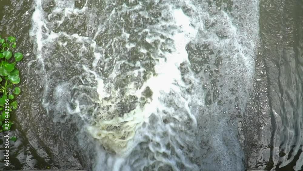 Slow motion of Dirty water from drain into the nature swamp. Environment problems, save the world concept. Slow motion of Dirty water from drain into the nature swamp. Environment problems, save the world concept.