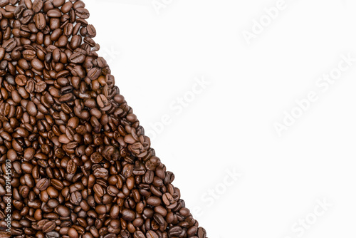 Roasted coffee beans on white background.