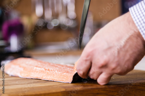 Filleting salmon.