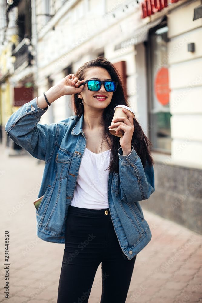 glamour woman in trendy outfit posing against the wall urban background,fashion look Outdoor fashion portrait of stylish young woman glamour woman in trendy outfit posing against the wall urban background,fashion look Outdoor fashion portrait of stylish young woman