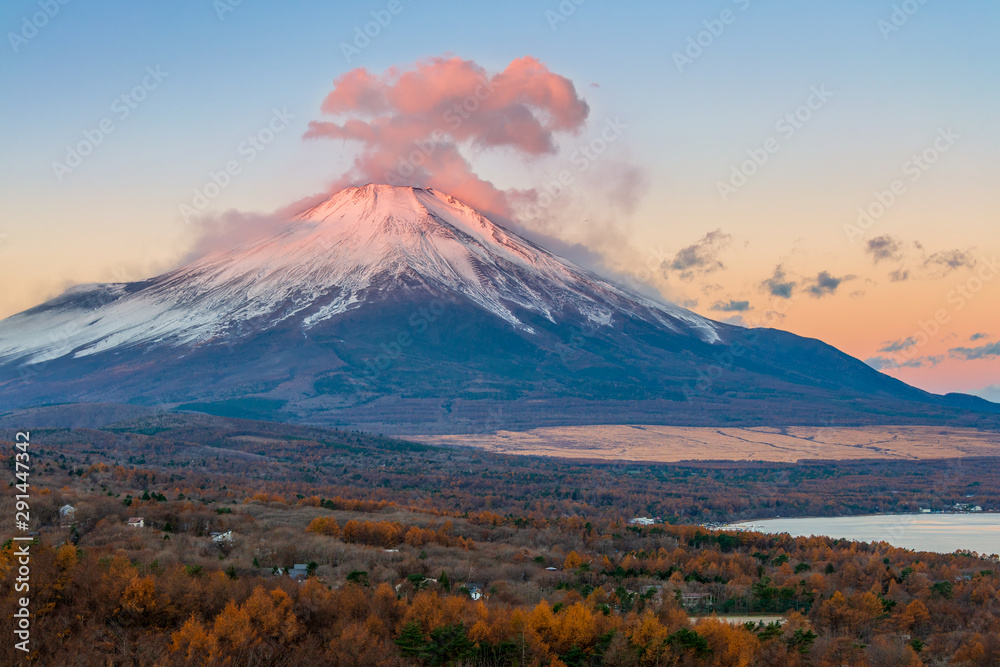 Fuji mountain with red reflective clouds covered the summit in early morning at Panorama-dai , lake Yamanakako.