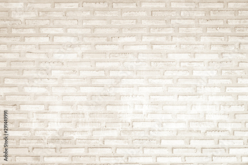 Wall cream brick wall texture background in room at subway. Brickwork stonework interior, rock old clean concrete grid uneven abstract weathered bricks tile design, horizontal architecture wall.