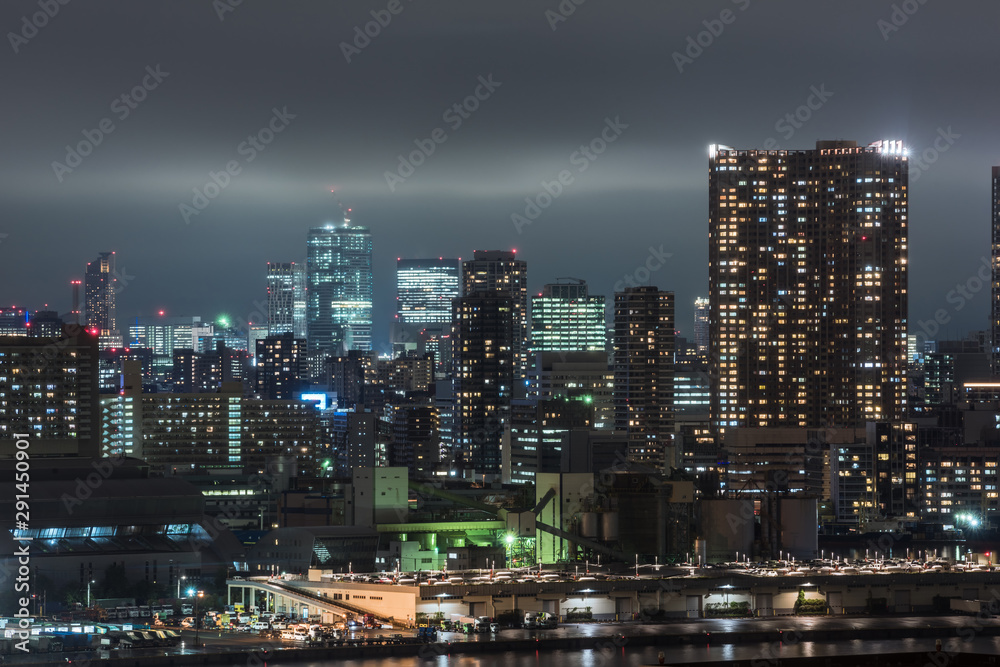 Panoramic modern city skyline bird eye aerial view of Tokyo bay under rainy night
