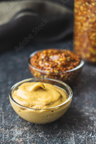 Yellow mustard and whole grain mustard.