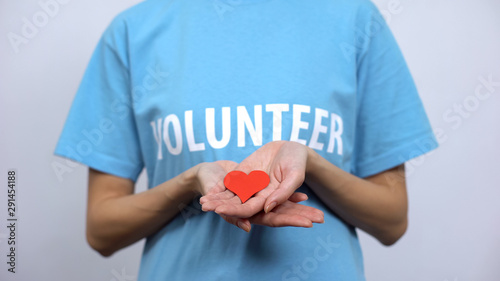 Fotografía Red heart sign in volunteer palms, health care, transplantation center, medicine