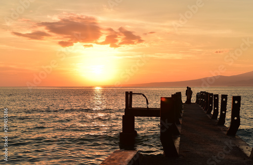 Sunrise in Gili Meno Island and Lombok Island at the backgroubd, Indonesia