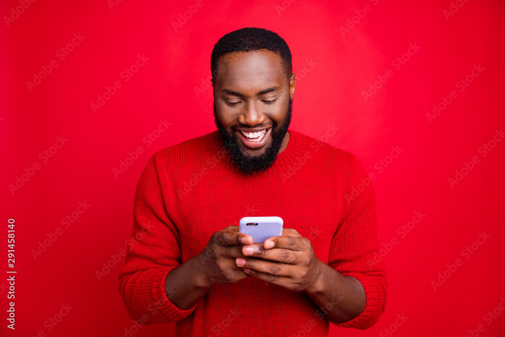 Close-up portrait of his he nice attractive cheerful cheery glad bearded guy chatting 5g app wireless connection playing game isolated over bright vivid shine red background Close-up portrait of his he nice attractive cheerful cheery glad bearded guy chatting 5g app wireless connection playing game isolated over bright vivid shine red background