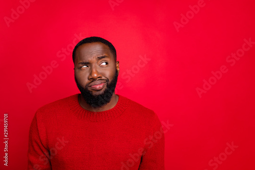 Close-up portrait of his he nice attractive skeptic doubtful bearded guy boyfriend creating plan guessing clue isolated over bright vivid shine red background
