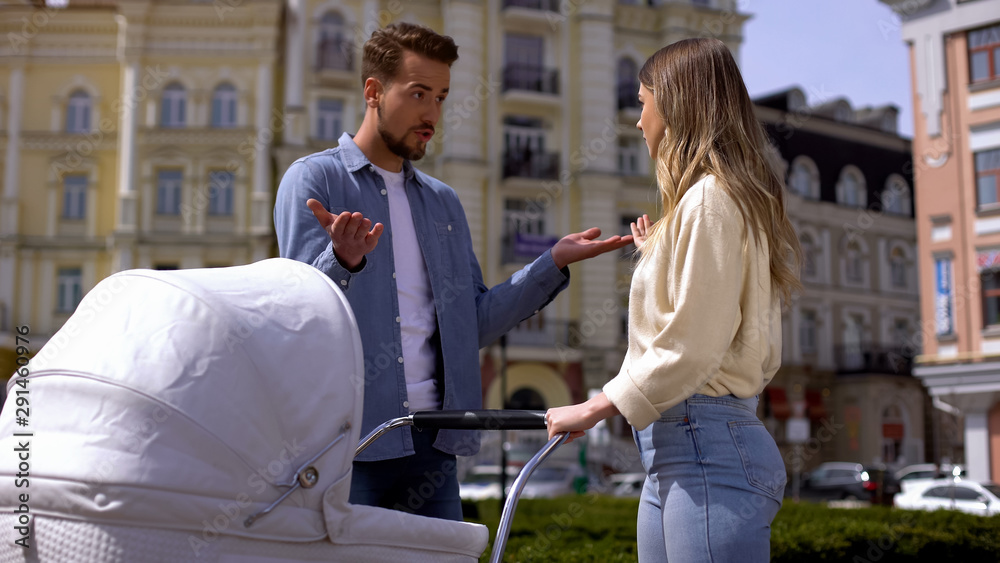 Obraz premium New parents conflicting as walking with baby in carriage, difficult time, crisis