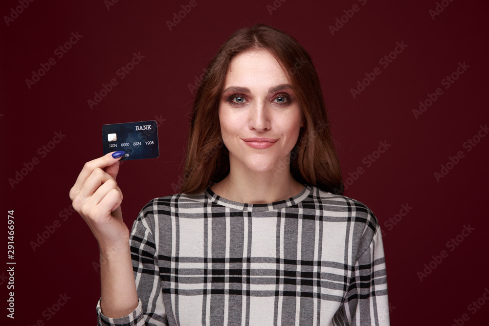 Woman showing credit card. Purchase online concept Woman showing credit card. Purchase online concept