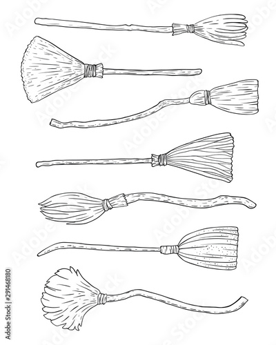 Hand drawn brooms set isolated on white