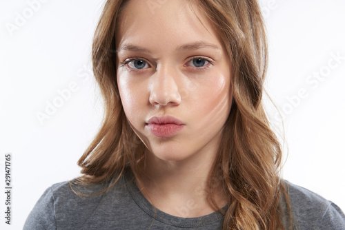 Photography Charming teen girl pouting lips and showing annoyance