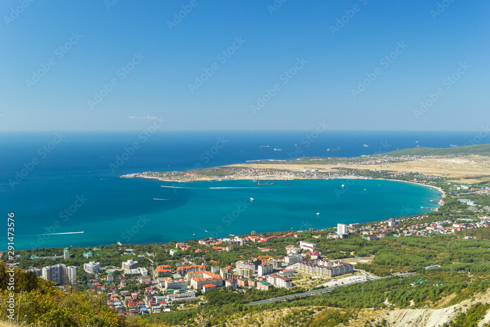 Aerial view of Gelendzhik city and sea bay. Photo of popular resort from hill of caucasian mountains.